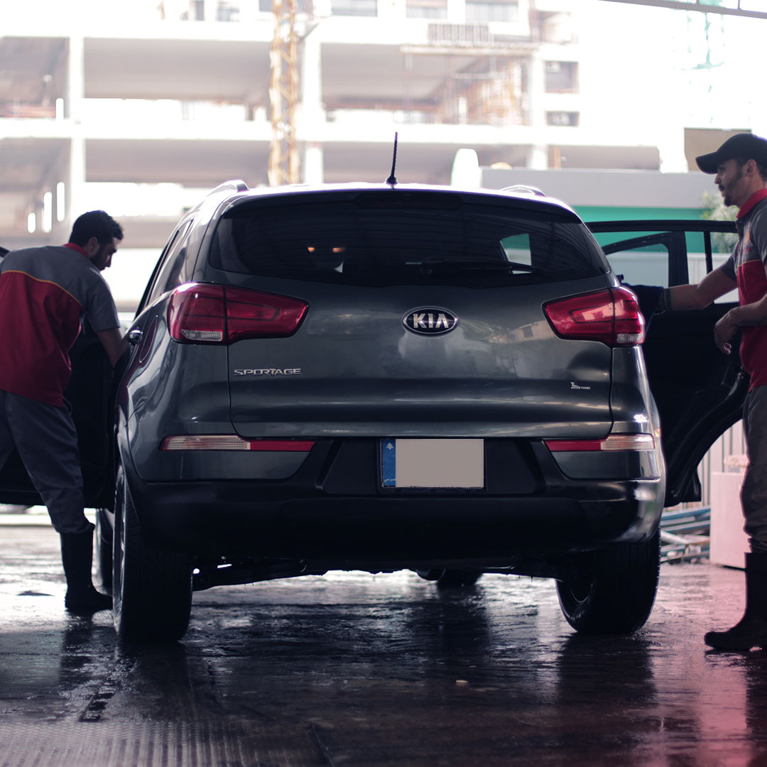 Image displaying a car being washed at Amana Petroleum Company's state-of-the-art car wash facility, showcasing our commitment to providing thorough and efficient cleaning services for vehicles.